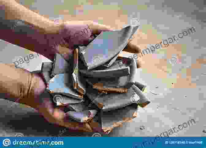 A Close Up Of A Hand Holding A Shattered Piece Of Pottery. Look Alive Out There: Essays