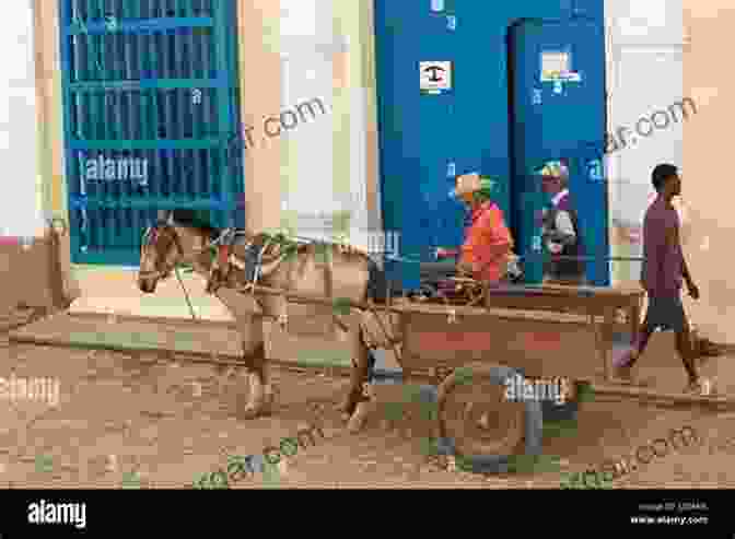 A Cobblestone Street In Trinidad, With Colorful Houses And A Horse Drawn Carriage Cuba: A Photographer S Journey Through Havana Trinidad