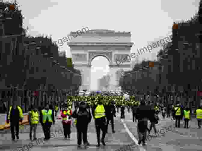 A Large Group Of Protesters Wearing Yellow Vests Blocking A Road France S Yellow Vests: Western Repression Of The West S Best Values