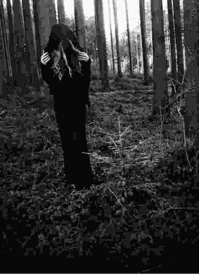 A Photograph Of A Solitary Witch Meditating In The Woods. Hedge Witch: A Guide To Solitary Witchcraft