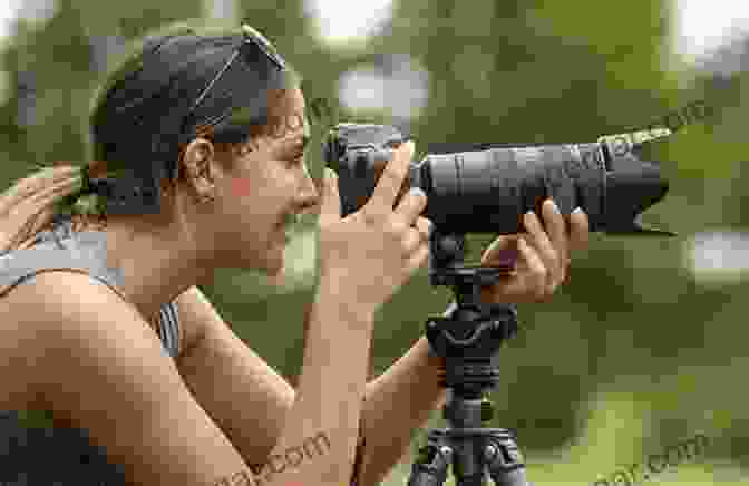 A Portrait Of [Author's Name] Holding A Camera In A Natural Setting, Surrounded By Vibrant Colors And Lush Vegetation. Light And Color In The Outdoors