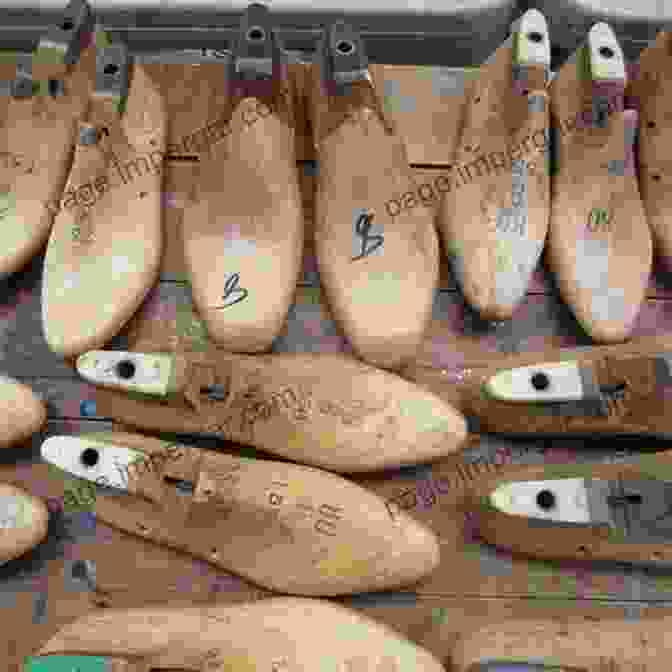 Artisan Crafting A Wooden Shoe Last How Shoes Are Made: A Behind The Scenes Look At A Real Sneaker Factory