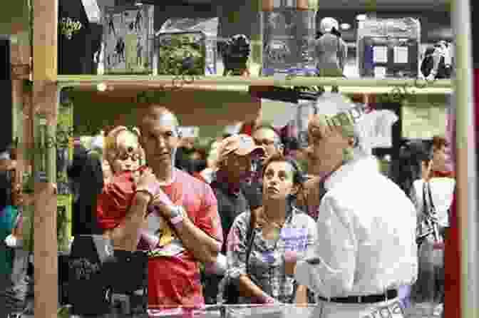 Attendees Browse A Vast Array Of Merchandise At Comic Con Phoenix, Showcasing The Commercialization Of The Event. People Watching Comic Con Phoenix 2024 Volume 1